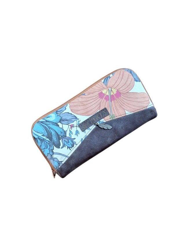 Ladies wallet made out of dark brown genuine leather and floral print.